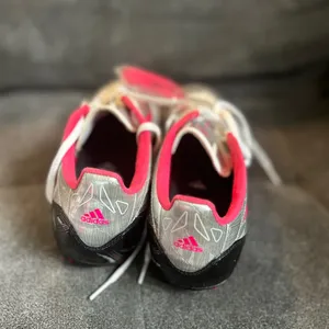 Adidas F10 TRX FG W women's soccer cleats in the silver and pink colorway thumbnail 5