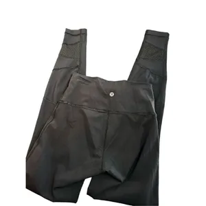 Lululemon mix & mesh black leggings size 4 - fair condition see pics full length thumbnail 3