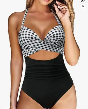 High waisted Bathing suit size Large . Looks like 2 piece but it's one p… thumbnail 1