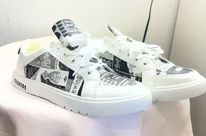 Women’s White Graphic Athletic Sneakers thumbnail 1