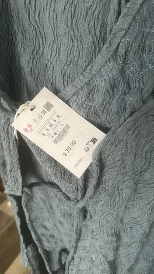 Flowing pants with an elastic waistband and textured thumbnail 8