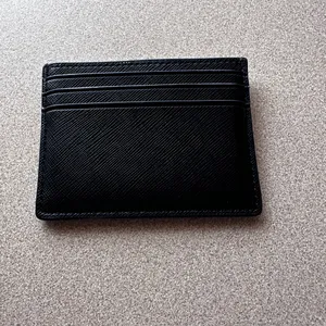 kate spade black cardholder with gold logo thumbnail 2