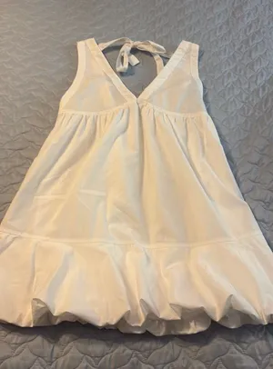 white baby doll dress with bows in back thumbnail 1