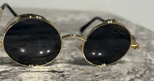 Round Gold and Black Sunglasses thumbnail 1