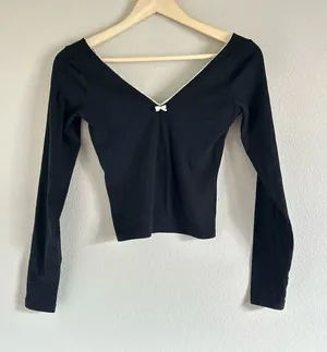 Aerie black long sleeve top with white bow detail. Size: XS MC2-7 thumbnail 1