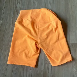 Alo Bright Orange Biker Shorts thumbnail 3