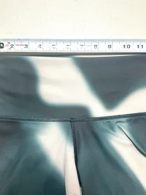Nike Dri-Fit High-Rise Leggings in Black and Cream thumbnail 10