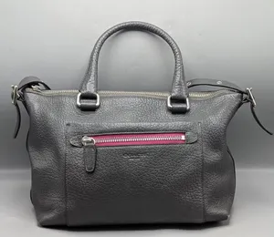 Woman’s Coach leather tote thumbnail 1