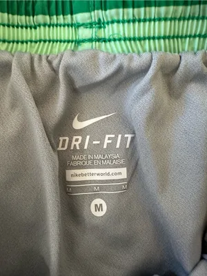 Nike Women’s Green and Pink Striped Athletic Shorts thumbnail 2