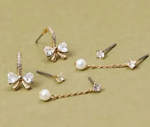 NEW Arula / Altar’d State Gold Bow and Pearl Earring Set NWT thumbnail 1