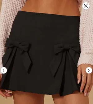 Altar'd State Florence Bow Mini Skirt thumbnail 1