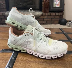 On Running Women's Pastel Mint and orange Cloud Sneakers thumbnail 1