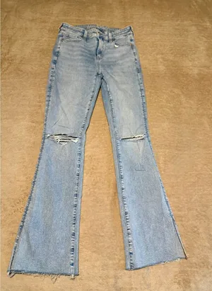 American Eagle Next Level Stretch Light Wash Distressed Flare Jeans thumbnail 1