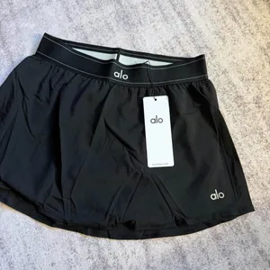 Alo Yoga black mini skirt size L thumbnail 1