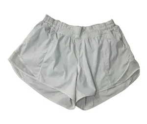 Lululemon Athletica Cream Women's Athletic Shorts - Elastic Waist in Size 12 thumbnail 1