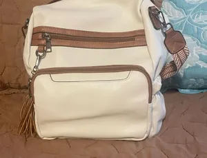 White and Brown Backpack with Textured Material and Multiple Compartments thumbnail 1