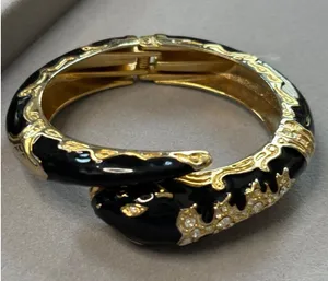 Gold & Black Snake-Inspired Hinged Bangle Bracelet With Rhinestone Embellishment thumbnail 1