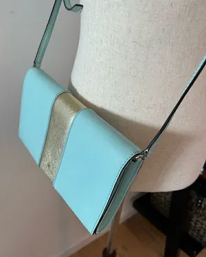 Kate Spade Teal AND gold crossbody bag thumbnail 1