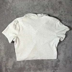 Nike Sportswear Essential Size XL Short-Sleeve Cropped Polo Heather Gray Swoosh thumbnail 10