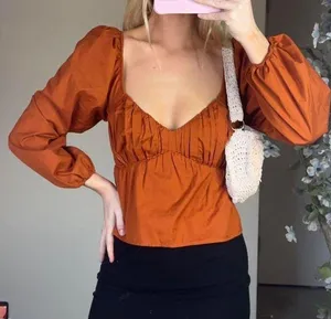 Abercrombie Fitch puff sleeve peplum babydoll top thumbnail 1