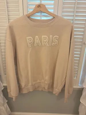 GB Dark cream crewneck with patch letters that spell out Paris thumbnail 1
