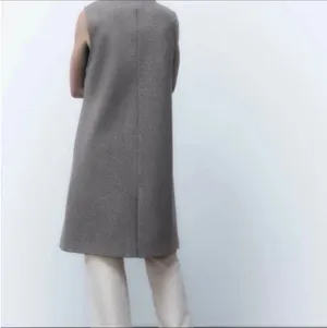Zara Cream Trousers with Gray Sleeveless Coat thumbnail 3