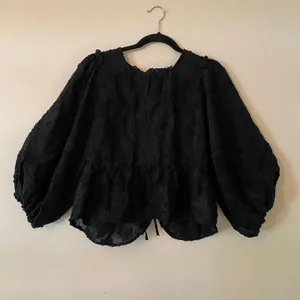 Free People Black Textured Sheer Flowy Blouse Open-Back Women's size Large thumbnail 2