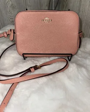 Coach Pebbled Leather Crossbody in Blush Pink thumbnail 1
