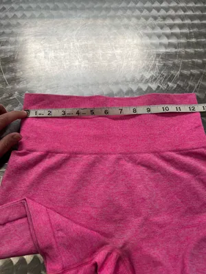 Comfortable high-waist seamless shorts in vibrant pink. Soft, stretchy fabric for unrestricted movement. Smooth waistband provides a flattering, secure fit. Ideal for workouts, yoga, or everyday wear. Size small thumbnail 5