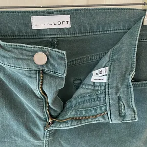 LOFT Skinny Ankle Mid-Rise Jeans in Muted Green thumbnail 2