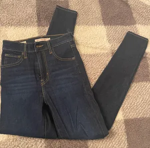 Levi's Mile High Super Skinny Jeans thumbnail 1