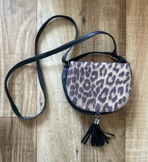 Claire's Leopard Print Crossbody Saddle Bag - Black and Taupe thumbnail 1