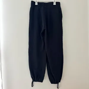 Black Nike sweatpants with drawstring waist and adjustable cuffs thumbnail 4