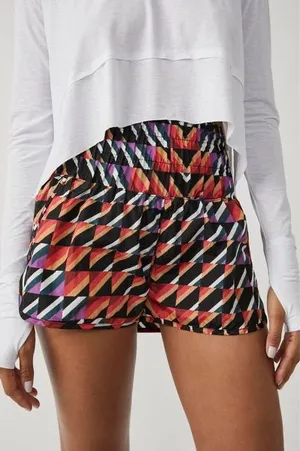 NWT Free people movement Orange crush combo print athletic shorts size Xs thumbnail 1