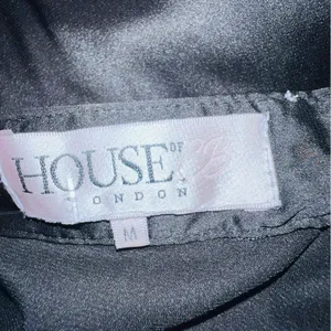 House Of CB, 'Tsarina' Black Satin Jumpsuit With Side Lace Ups thumbnail 13