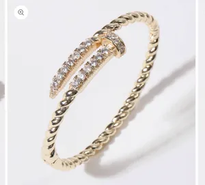 Pave Edge Twisted Gold Plated Bangle Bracelet thumbnail 2