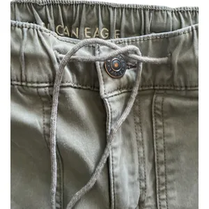 American Eagle -ARMY GREEN JOGGER PANTS-SIZE 2 Elastic waist with drawstring, zip front, two front and two back pockets, elastic ankles with a side zipper, excellent condition Measurements: Waist: side to side 13-16 inches Rise: 9 inches Inseam: 37 inches thumbnail 6