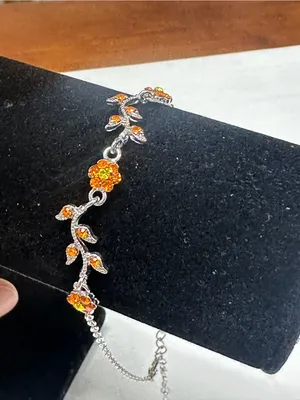Silver Floral Bracelet with Bright Orange Crystal Accents thumbnail 2