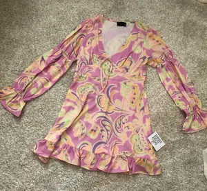 New without tag ASOS elasticated sleeve tie neck mini dress in pink floral print thumbnail 1