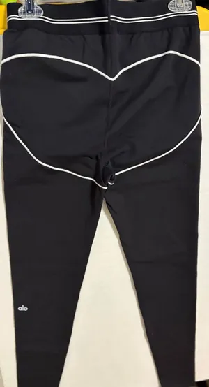 New nwt Alo yoga heart throb leggings black white large authentic thumbnail 1