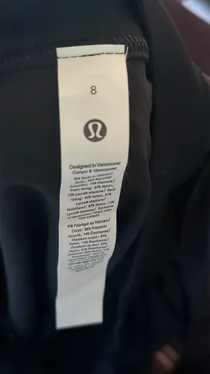Lululemon The lighting isn’t the best but this is a black skirt with no fading and tag intact with no wrinkle thumbnail 7