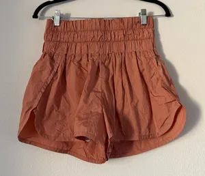FP Movement by Free People Smocked High-Waist Athletic Shorts in Rust thumbnail 1