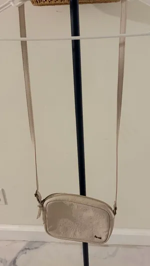 The Sak Beige Embossed Crossbody Bag thumbnail 1