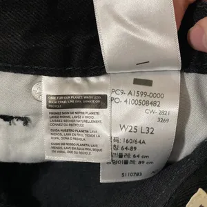 Levi’s premium high loose flare jeans in black size 25 thumbnail 15