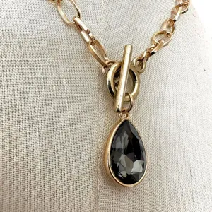 Gold tone grey rhinestone teardrop pendant necklace thumbnail 2