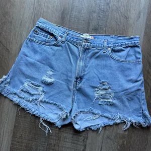 Y2K Levi’s Comfort Fit Distressed Cutoff Shorts thumbnail 1