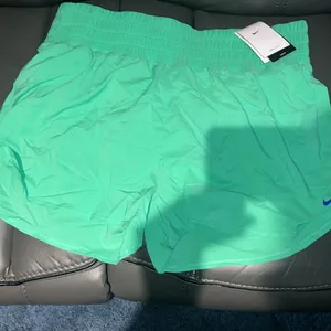 Nike Women's Athletic Shorts - Green thumbnail 2