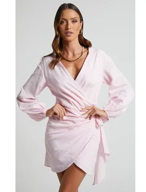 Showpo MARIFY MINI DRESS - LINEN LOOK LONG SLEEVE WRAP DRESS IN ICE PINK thumbnail 1