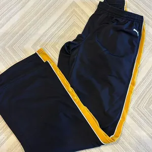 Puma Women’s Wide Leg Black & Gold Athletic Pants - Size M thumbnail 1