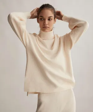 Oysho ribbed asymmetric high neck turtleneck knit sweater thumbnail 1